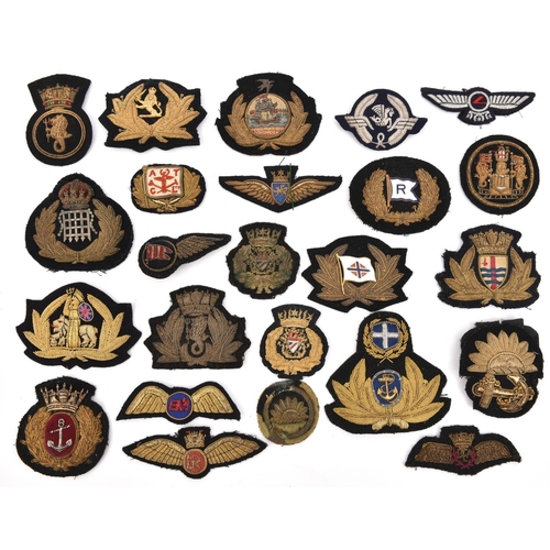 445 - 10 various bullion embroidered shipping line badges,  10 various airline bullion badges and wings, a... 