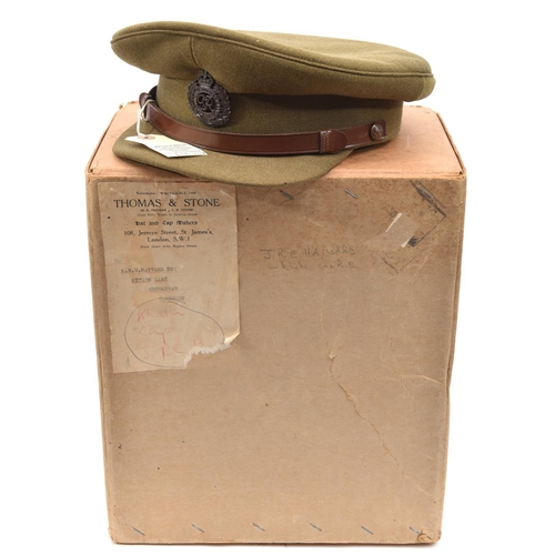 481 - A Geo VI officer’s khaki peaked cap of The R Engineers,  cloth peak, leather chinstrap, bronzed badg... 