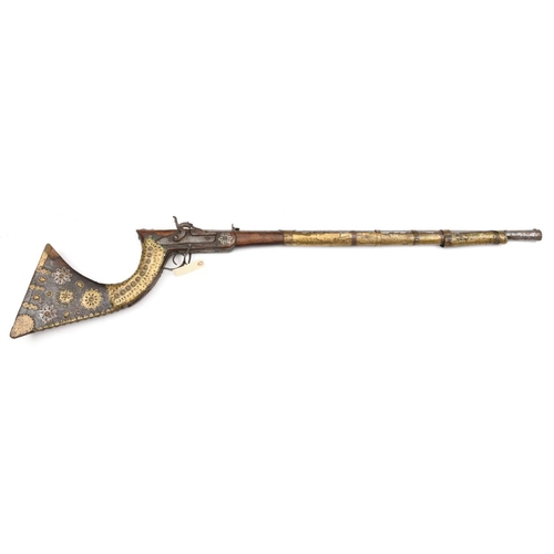 530 - An Indian 48 bore percussion jezail,  46” overall, rifled octagonal barrel 32” with single folding l... 