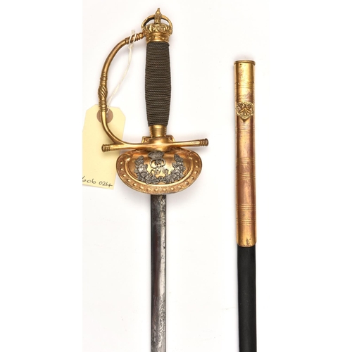 559 - A Geo V courtsword, slender DE blade 31”, etched with foliate panels, gilt hilt with turn down shell... 