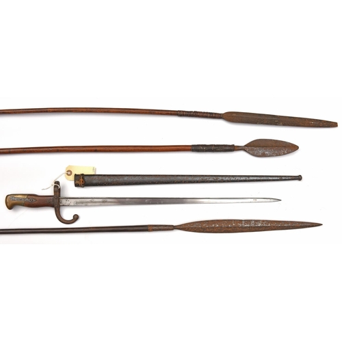 568 - A French Gras bayonet,  d 1876 on backstrap, matching nos to hilt and scabbard (some surface rust); ... 