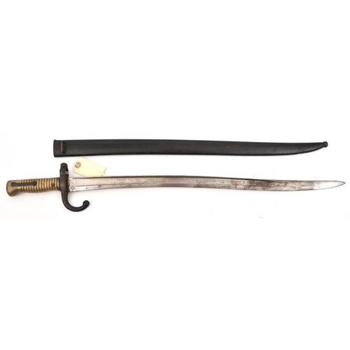 584 - A Chassepot bayonet,  marked “Mfre d’Armes de St Etienne Aout 1873” on backstrap, in its black paint... 