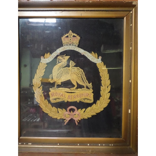 312 - A silk embroidered panel depicting the badge of Princess Charlotte of Wales Royal Berkshire Regiment... 