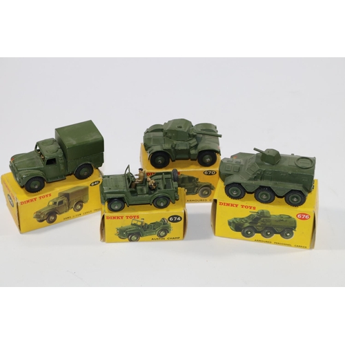 344 - 4 Dinky Military Toys. Army 1-Ton Cargo Truck (641). Armoured Car (670), Austin Champ (674) and an A... 