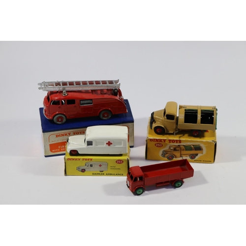 345 - 4 Dinky Toys. Commer Fire Engine - with extending ladder (555). Bedford Refuse Wagon (252) in light ... 