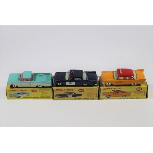 356 - 3 Dinky Toys North American Cars. R.C.M.P. Patrol Car (264) Ford Fairlane in dark blue with white do... 