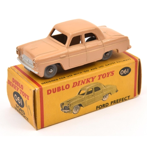 1384 - Dublo Dinky Toys Ford Prefect (061) In fawn with grey smooth plastic wheels. Boxed. Vehicle Mint. £3... 