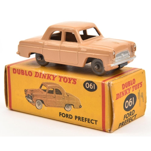 1384 - Dublo Dinky Toys Ford Prefect (061) In fawn with grey smooth plastic wheels. Boxed. Vehicle Mint. £3... 