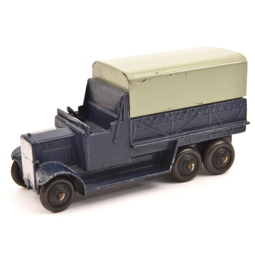 1392 - A Dinky Toys 6 Wheeled Transport Wagon. An example in Royal Navy Blue with grey tin tilt, black ridg... 