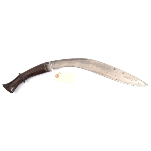 34 - An early 19th century kukri,  blade 14½”, with twin back fullers for one third length, polished dark... 