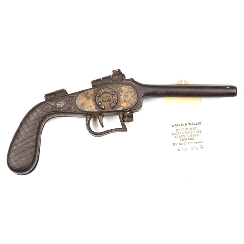 434 - A 19th century cast iron novelty folding boot jack, in the form of a double barrelled pistol, 8” ove... 