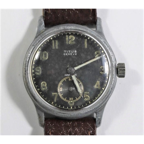 536 - D marked Titus wristwatch. Serial D891542. Base metal case, no plating remaining, 32mm without crown... 