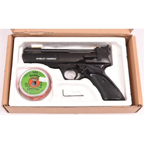 749 - A good .22” Webley Tempest air pistol,  cast under the right grip 2066A, black lacquered finish with... 