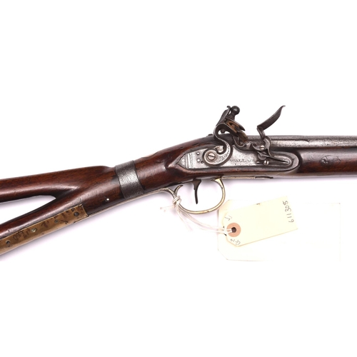 779 - A 20 bore flintlock coaching carbine by Wallace,     c 1785,  37” overall, barrel 22”, with break of... 