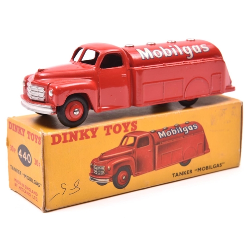 1458 - Dinky Toys Studebaker Tanker 'Mobilgas' (440/30p). In bright red livery. Boxed, minor marking. Vehic... 