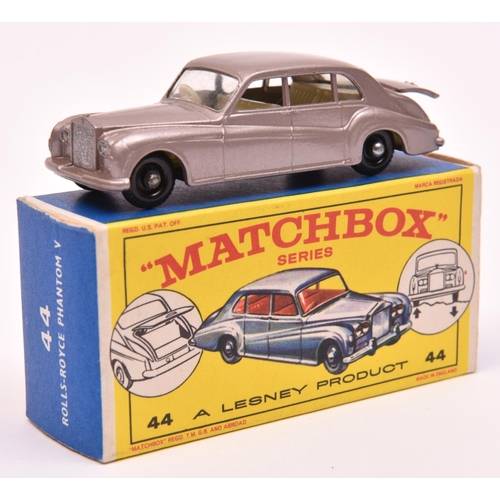 1227 - Matchbox Series No.44 Rolls Royce Phantom V. In metallic mauve with white interior, black plastic wh... 