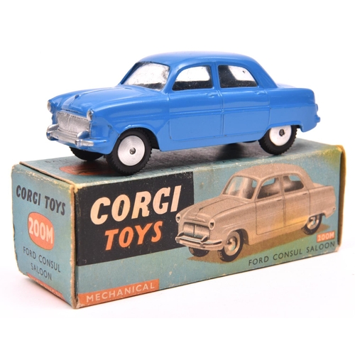 1247 - An scarce early Corgi Toys Mechanical Ford Consul Saloon (200M). An example in mid blue with smooth ... 