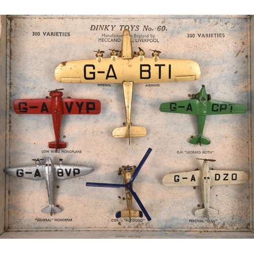 1493 - A Dinky Gift Set No.60 British Aroeplanes. Comprising; 60a, Imperial Airways 4-engine liner in gold,... 