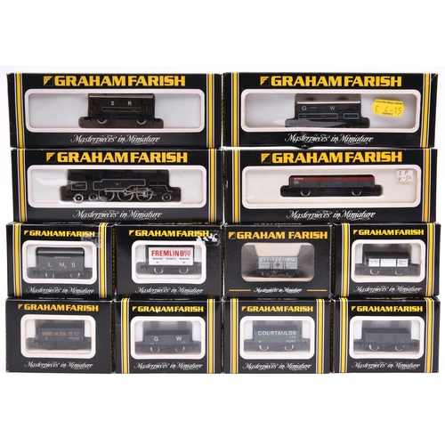 1013 - A quantity of Graham Farish N gauge railway. A BR Standard 4MT 2-6-4 tank RN 80079 in lined black li... 