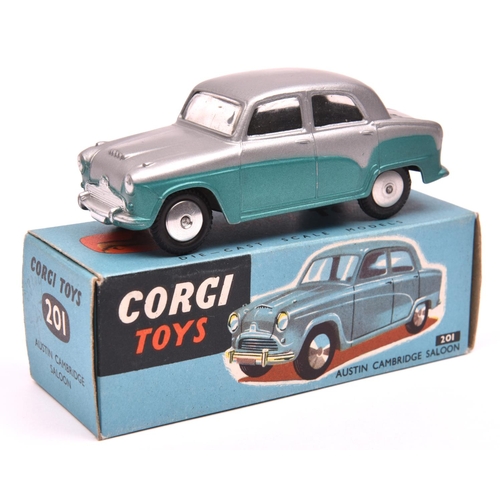 1249 - Corgi Toys Austin Cambridge Saloon (201). A very early two tone example in silver and metallic sea g... 