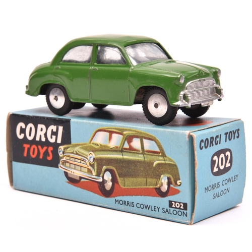 1250 - Corgi Toys Mechanical Morris Cowley Saloon (202M). An example in dark green with smooth spun wheels ... 