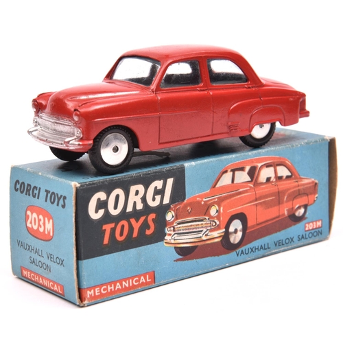 1251 - Corgi Toys Mechanical Vauxhall Velox Saloon (203M). An example in red with smooth spun wheels and bl... 