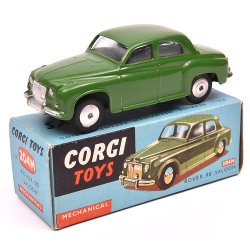 1253 - Corgi Toys Mechanical Rover 90 Saloon (204M). An example in dark green with smooth spun wheels and b... 