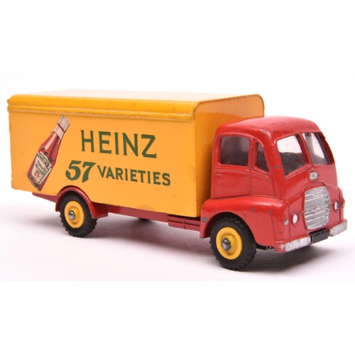 1468 - A scarce Dinky Supertoys Guy Warrior Van (920). In red and yellow Heinz livery with Tomato Ketchup b... 