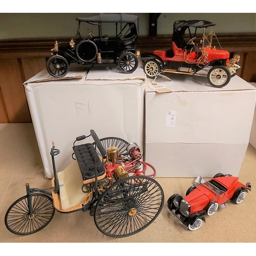 1172 - 4 Franklin Mint vehicles. 1896 Benz Patent Motorwagen. In red & black. 1911 Stanley Steamer 62 Runab... 