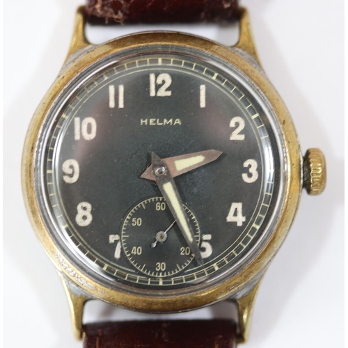 172 - Helma wristwatch. Plated case with brushed finish, heavy wear, most plating missing. Fixed bars. Scr... 