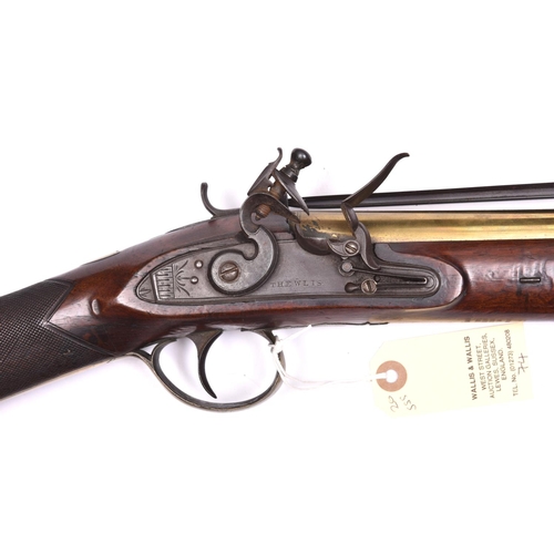 15 - A brass barrelled flintlock blunderbuss with spring bayonet, c 1820, 29½” overall, bell mouth barrel... 