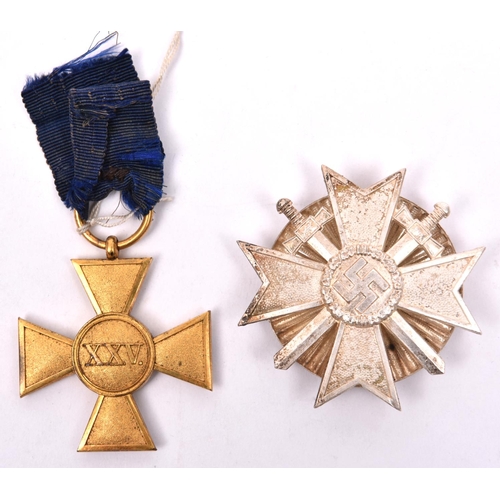 181 - A Third Reich War Merit Cross 1st class,  with screw in fluted disc fitting, VGC; and an Imperial Ge... 