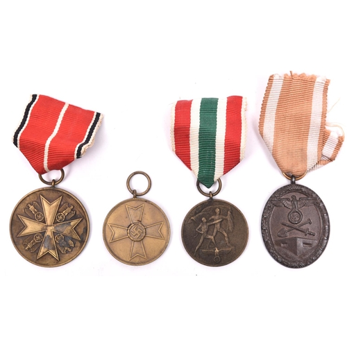 182 - Third Reich medals: bronze Medal of Merit without swords; Return of Memel; West Wall; and War Merit ... 