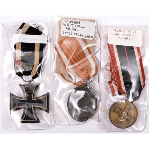 184 - 3 German medals: 1914 Iron Cross 2nd class; Third Reich West Wall medal; and War Merit medal, all wi... 