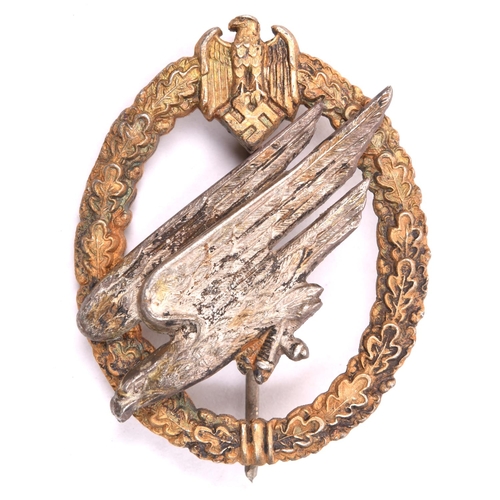 195 - A Third Reich Army Parachutists badge,  of heavy construction with matt finish to gilt wreath and si... 