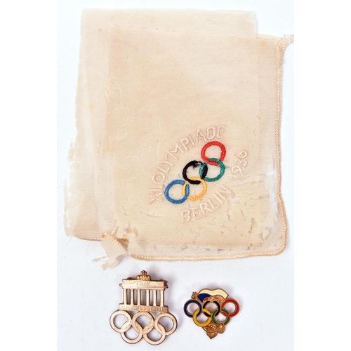 197 - A German small gilt and white enamel pin back badge for the 1936 Berlin Olympics,  the back marked “... 