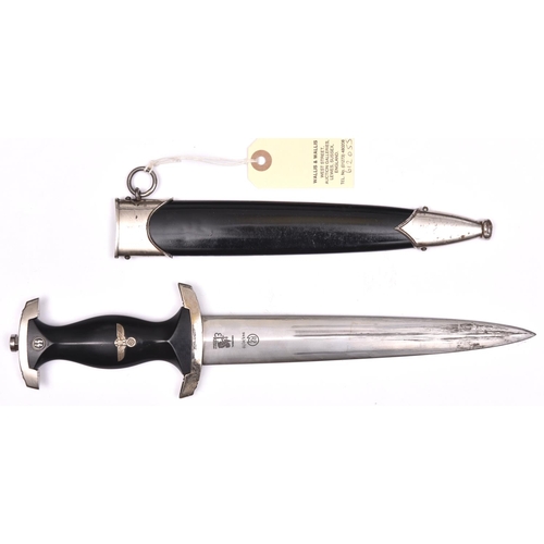 220 - A Third Reich Model 1933 SS dagger, the blade with post 1941 Eickhorn mark and RZM mark over “941/37... 