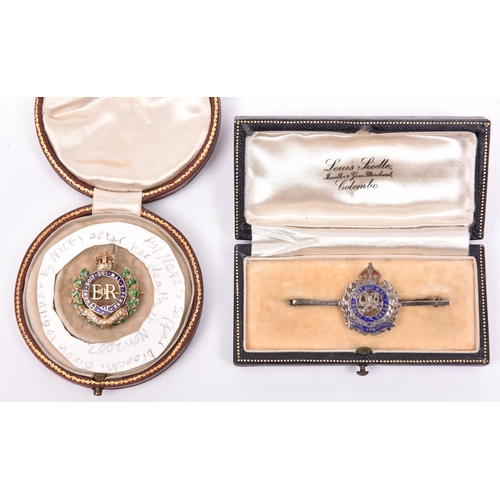 224 - An ERII 9ct gold sweetheart badge of The R Engineers, HM G Co Ltd B’ham 1969, and an enamelled Geo V... 