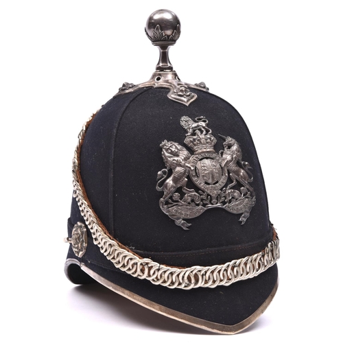 259 - A Vic Volunteer officer’s ball topped blue cloth helmet,  silver plated front peak binding, ear rose... 