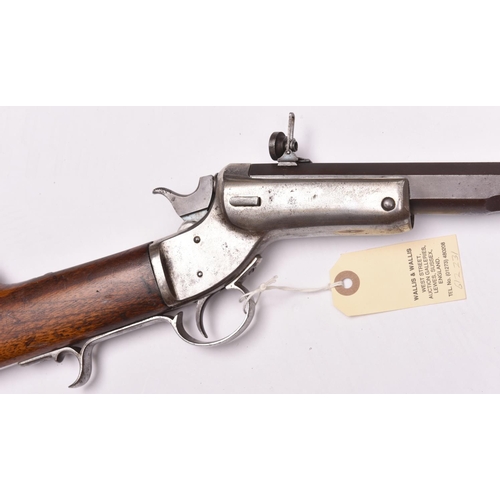 302 - A .32” rimfire Stevens centre hammer tip down rifle,  number 10431, 40½” overall, heavy octagonal ba... 