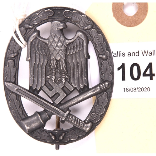 104 - A Third Reich General Assault badge, with dull grey finish, the solid flat back marked “Frank & Reif... 