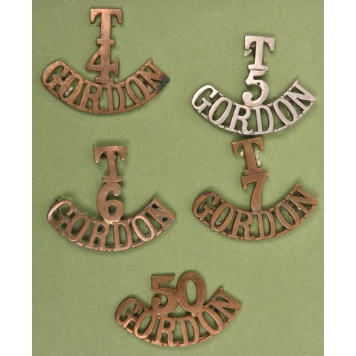 204 - 4 Gordon Highlanders (Territorial) shoulder titles:  brass T/4/Gordon with backing plate, T/6/Gordon... 