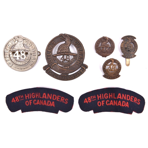 208 - A bronzed WWI glengarry badge of the 15th CEF (48th Highlanders) and one matching collar; a bronzed ... 