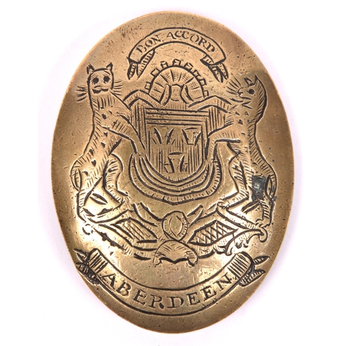 216 - A brass oval SBP locally engraved with the Arms of Aberdeen and leopard supporters, one full face, t... 