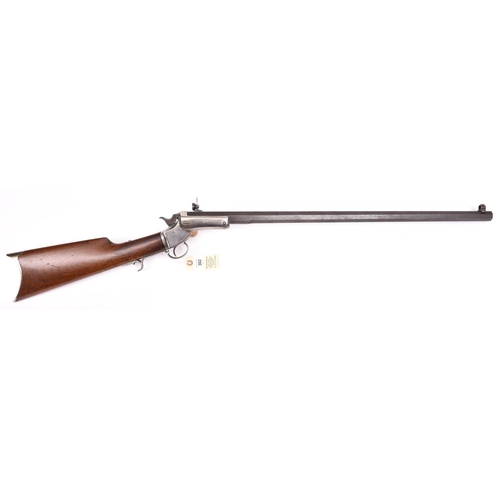 302 - A .32” rimfire Stevens centre hammer tip down rifle,  number 10431, 40½” overall, heavy octagonal ba... 