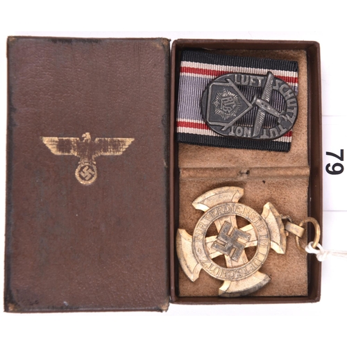 79 - A Third Reich 1st class Luftschutz Decoration, with ribbon, in its box. GC (gilt finish worn); also ... 