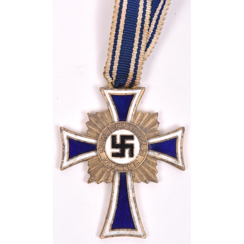 83 - A Third Reich Mother's Cross, appears to have originally been gold, the back retaining gold finish, ... 