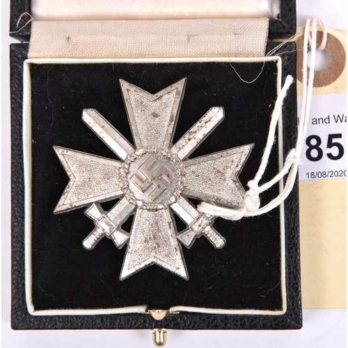 85 - A Third Reich War Merit Cross with Swords, the pin stamped “1”. GC in its fitted case.