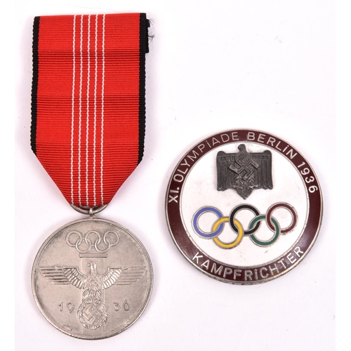 86 - A Third Reich 1936 Olympic Games medal, with ribbon; and an enamelled pin-back Olympics judges badge... 