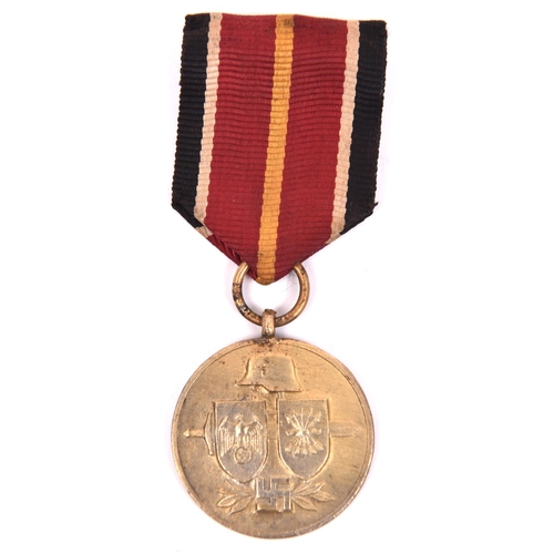 87 - A Third Reich medal for the Spanish “Blue Division”, which fought on the Russian front, with ribbon.... 